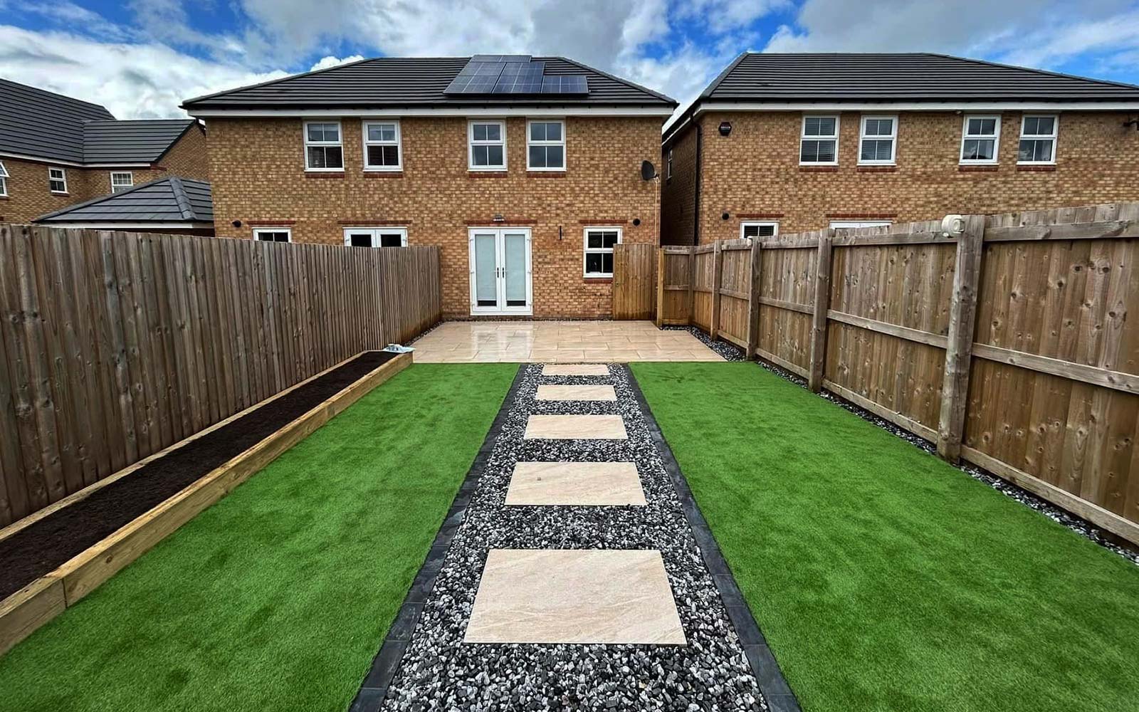 Landscaped garden with planted beds