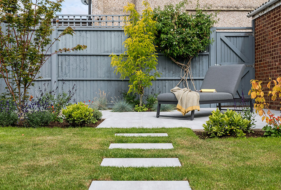 Fresh turf and planted garden